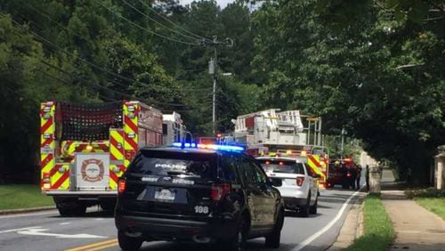 A hazmat unit has been called to the scene on a road in north Fulton County after a barrel fell off a truck.