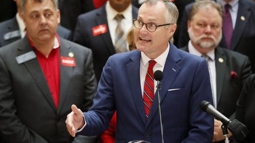 3/6/18 - Atlanta - Lt. Gov. Casey Cagle, surrounded by supporters, addresses the media after he qualified to run for governor this afternoon.  Qualifying for Georgia's 2018  elections began Monday and runs through Friday.  Georgia has races for Governor, Lieutenant Governor and other statewide posts, and every congressional seat nationwide is up for a vote in November.  BOB ANDRES  /BANDRES@AJC.COM
