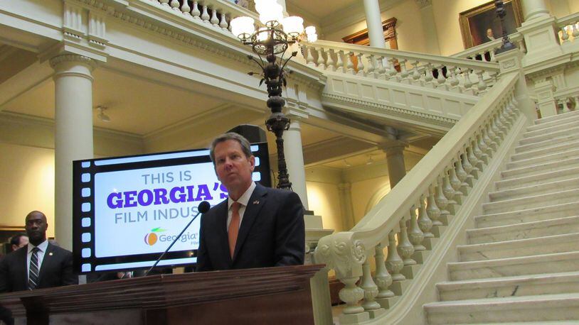 While speaking Tuesday at Georgia Film Day, Gov. Brian Kemp thanked the industry for making Georgia “the top state for on-location filming.” He added: “Our film and television projects showcase to the rest of the world the true extent of our state’s beauty and diversity. Like you, I’m proud to see the peach logo at the end of a new movie or TV show.” Photo: Jennifer Brett, jbrett@ajc.com