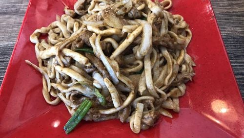 The sha cha beef noodles at Xiao’s Way Noodle House in Johns Creek are bathed in a nutty, umami-rich Taiwanese barbecue sauce, and they are positively addictive. CONTRIBUTED BY WENDELL BROCK