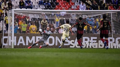 Atlanta United goalkeeper Brad Guzan #1 saves the ball during the first half of the first leg match between Atlanta United FC and Club America in the quarterfinal round of the 2020 Scotiabank Concacaf Champions League at Estadio Azteca in Mexico City, Mexico, on Wednesday March 11, 2020. (Photo by Jacob Gonzalez/Atlanta United)