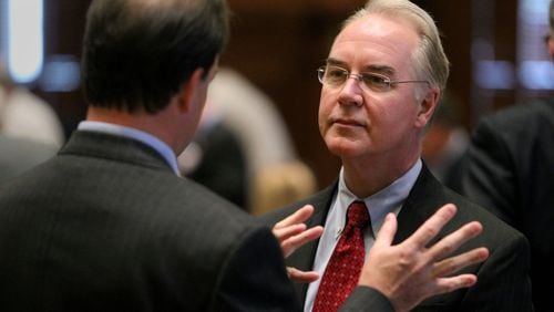 U.S. Rep. Tom Price, right, talks with a fellow republican during the first day of candidate qualifying in the House and Senate Chambers at the State Capitol Wednesday morning in Atlanta, Ga., May 23, 2012. The republican party was qualifying in the House and the democratic party was qualifying in the Senate. JASON GETZ / JGETZ@AJC.COM Five years after landmark ethics reforms restricted travel for members of congress funded by outside groups, that kind of travel is back on the rise -- and ethics advocates say it's because interest groups are exploiting a loophole that allows them to form an affiliated charitable arm to fund the trips. Two of the biggest are a trip to Israel affiliated with a powerful pro-Israel lobby and a yearly congressional retreat funded by the conservative Heritage Foundation. The groups and members say these trips are important educational experiences. Advocates for tighter ethics regulations say they are another opportunity for special interest access. Look in detail about where the Georgia delegation is going and who's paying. Can break those numbers out with a box. Tops in the delegation for outside-funded trips are freshman Republican Rep. Austin Scott, at around $75,000, and Democrat Rep. Hank Johnson, at $68,000, in trips for themselves and staff members since January 2011. Health Secretary Tom Price. (AJC file)