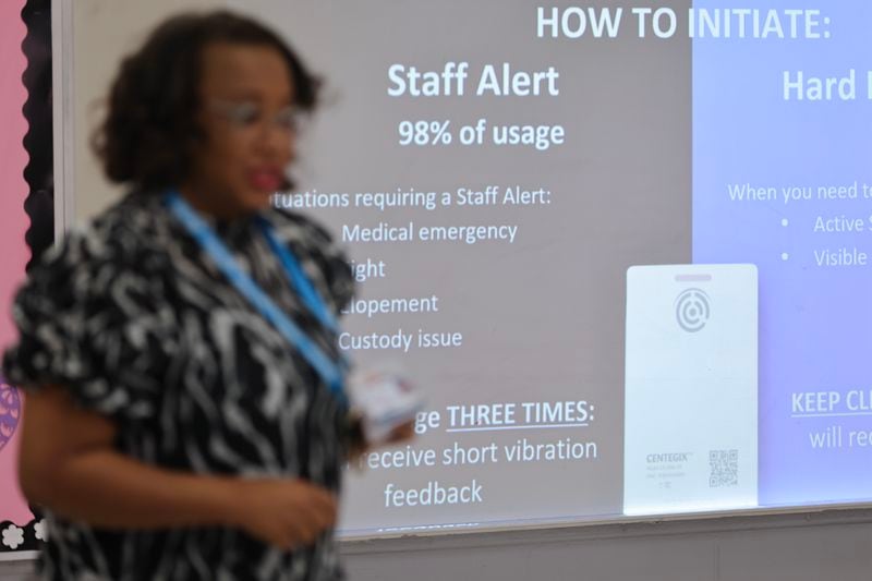 Centegix Implementation Specialist Theresa Sullivan speaks during a training on how to use the crisis alert badges at Fulton County's Findley Oaks Elementary School on Monday, March 20, 2023.  (Natrice Miller/ natrice.miller@ajc.com)