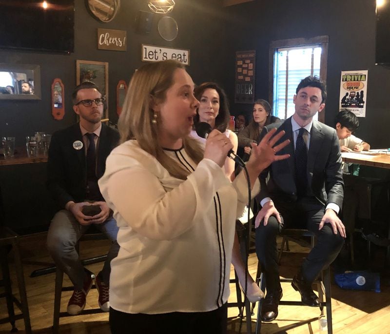 Sarah Riggs Amico speaks as Ted Terry, Teresa Tomlinson and Jon Ossoff listen at a January 20 forum of Senate Democratic candidates.