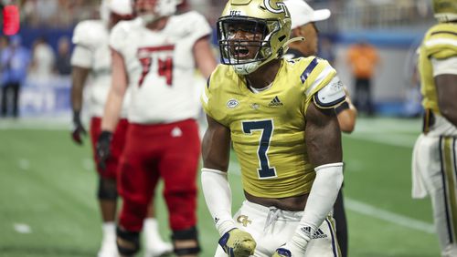 Georgia Tech linebacker Trenilyas Tatum (7) reacts to a defensive play during the third quarter against Louisville in the Aflac Kickoff Game at Mercedes-Benz Stadium, Friday, September 1, 2023, in Atlanta. Georgia Tech lost to Louisville 39-34. (Jason Getz / Jason.Getz@ajc.com)