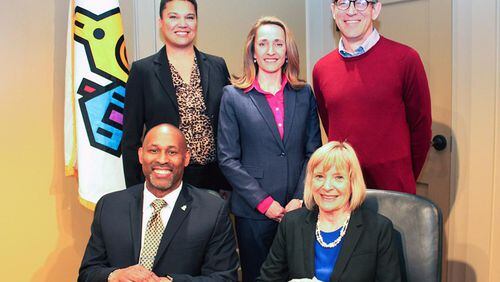 Decatur's city commission, seated l-r Mayor Pro Tem Tony Powers and Mayor Patti Garrett, and standing l-r, Lesa Mayer, Kelly Walsh and George Dusenbury. Courtesy City of Decatur