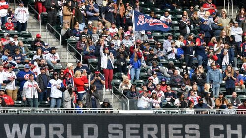 Fans cheer during a Truist Park ceremony celebrating the Braves' World Series win on Nov. 5, 2021. (Hyosub Shin / Hyosub.Shin@ajc.com)