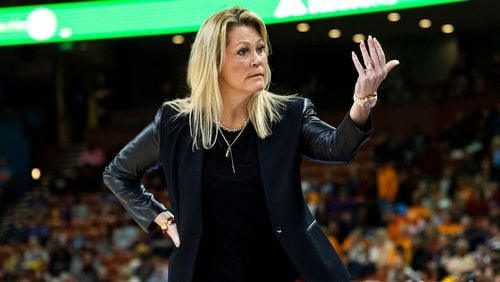 Georgia coach Katie Abrahamson-Henderson looks to her bench in the first half of an NCAA college basketball game against LSU during the SEC women's tournament in Greenville, S.C., Friday, March 3, 2023. (AP Photo/Mic Smith)
