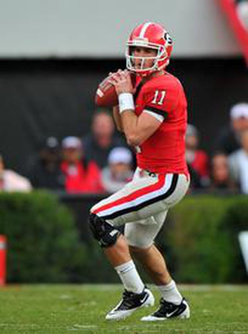 Former Georgia quarterback Aaron Murray is recovering from knee surgery and will take part in the off-the-field portions of the2014 NFL Scouting Combine. (Brant Sanderlin / AJC)