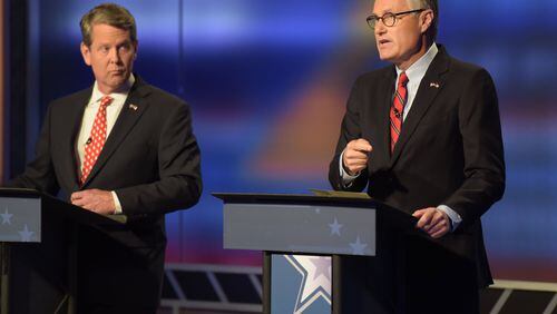Secretary of State Brian Kemp (left) and Lt. Gov. Casey Cagle during the second and final televised GOP gubernatorial runoff debate at a Channel 2 Action News studio on July 15, 2018. The runoff to decide the Republican candidate for governor will be held July 24. (Jenna Eason / Jenna.Eason@coxinc.com)