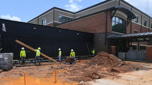 There is massive construction going on at Lilburn Middle School while it gets an extensive exterior face lift. JOHN AMIS