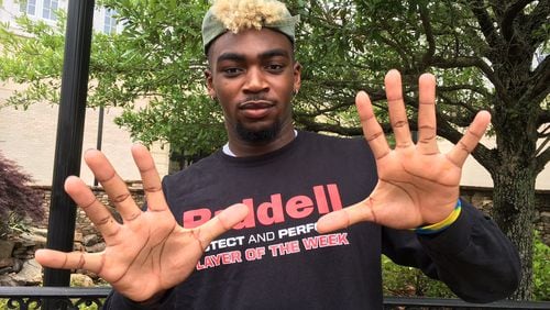 Georgia Tech freshman wide receiver Pejé Harris' efforts to improve included thumb-stretching exercises.