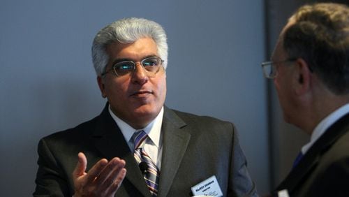 Rajeev Dhawan, director of the Georgia State Economic Forecasting Center, shrugged off several months of job losses, saying that he expects job growth to be solid this year.