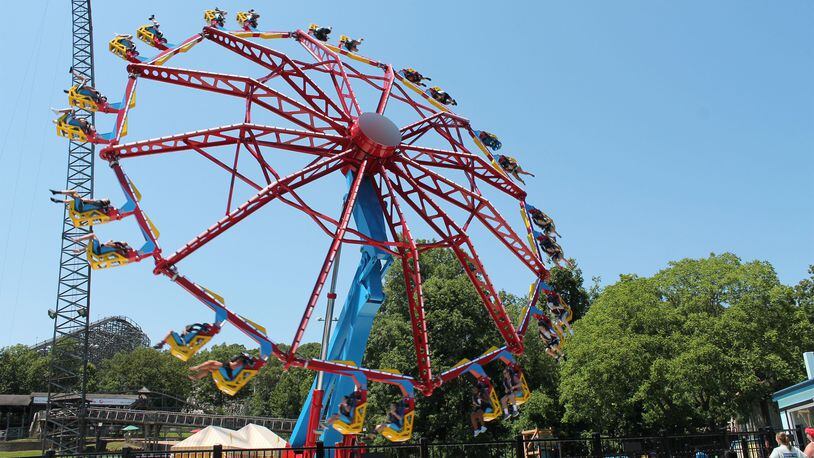 Six Flags Over Georgia said it removed the young people who engaged in fights Saturday.