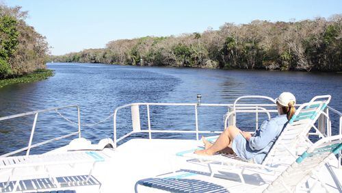 The top deck of a houseboat is a good spot to relax and take in the view of the St. Johns River. (Nancy Moreland/Chicago Tribune/TNS)