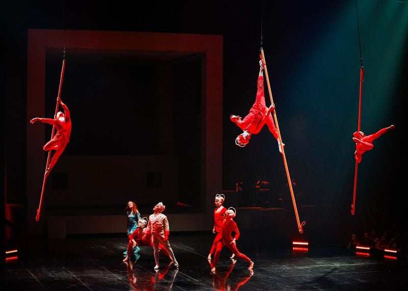 Artists move across the "Echo" stage on poles. Photo: Jean-François Savaria