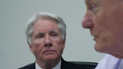 November 17, 2016 Decatur - Claud “Tex” McIver looks as his lawyer Steve Maples speaks on Thursday, November 17, 2016. McIver, an Atlanta lawyer, said he accidentally shot his wife Diane McIver Sunday, Sept. 25, while the couple headed home in their SUV. HYOSUB SHIN / HSHIN@AJC.COM