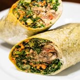 The Dat Ish Wrap from Tassili's Raw Reality is the size of a burrito and packs a heavy punch in terms of both flavor and satisfaction. CONTRIBUTED BY HENRI HOLLIS