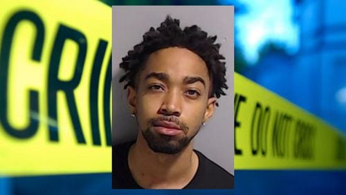Phillip Mills is in custody after two people were fatally shot in Midtown Atlanta on Sunday.
