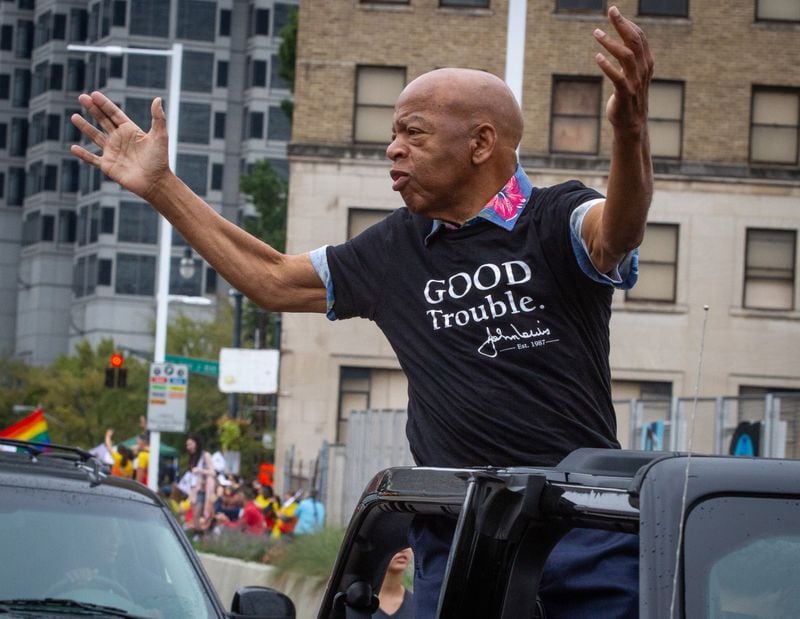 Congressman John Lewis waves to the crowd as he makes his way down Peachtree Street during the 49th annual Pride Festival and Parade in Atlanta Sunday, Oct. 13, 2019.  STEVE SCHAEFER / SPECIAL TO THE AJC