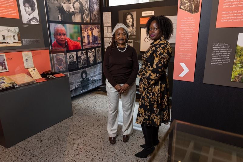 (L-R) Professor Nagueyalti Warren and curator Gabrielle Dudley pose for a portrait in the Alice Walker section of the At the Crossroads exhibit.at Emory.. (Arvin Temkar / arvin.temkar@ajc.com)