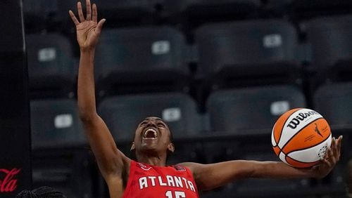 Atlanta Dream guard Tiffany Hayes (15) shoots against the Seattle Storm. (AP Photo/John Bazemore)