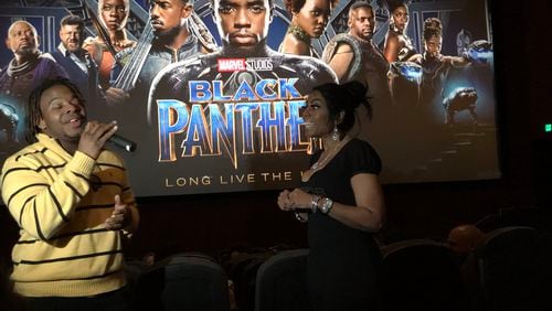 Sasha the Diva (right), the afternoon jock at Kiss 104.1, had some contestants sing for prizes before a "Black Panther" screening Tuesday night, February 13, 2018. CREDIT: Rodney Ho/rho@ajc.com