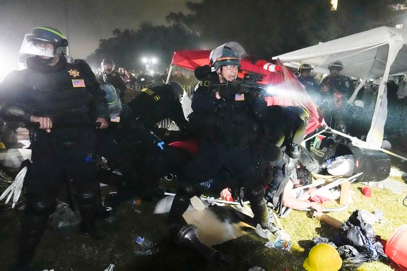 FILE - Police advance on pro-Palestinian demonstrators in an encampment on the UCLA campus Thursday, May 2, 2024, in Los Angeles. (AP Photo/Jae C. Hong, File)