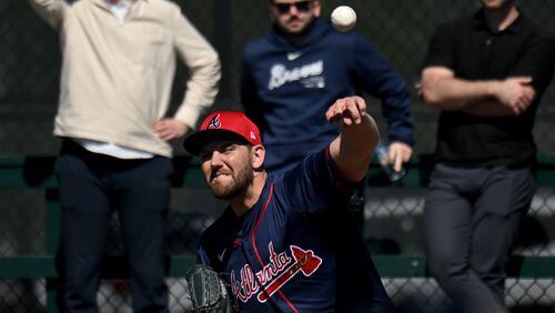 Atlanta Braves relief pitcher Dylan Lee throws in the bullpen during the first full-squad spring training workout at CoolToday Park, Feb. 20, 2024, in North Port, Florida. (Hyosub Shin / Hyosub.Shin@ajc.com)