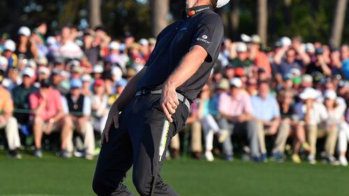 Justin Rose reacts to missing a putt on the 18th hole. He and Sergio Garcia would both finish at 9-under, forcing a one-hole playoff. Play begins in the final round of the 81st Masters tournament at the Augusta National Golf Club, Sunday, April 9, 2017. BRANT SANDERLIN / SPECIAL