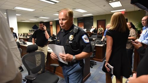 Cobb County Police Chief Mike Register enters the room  for a press conference at Emergency Operations Center in Marietta on Thursday, August 31, 2017.  HYOSUB SHIN / HSHIN@AJC.COM