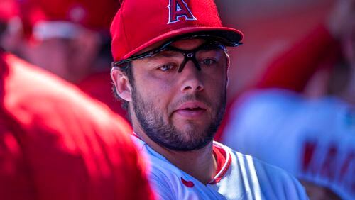 Los Angeles Angels shortstop David Fletcher looks over in the dugout before a baseball game against the Seattle Mariners in Anaheim, Calif., Wednesday, Aug. 17, 2022. (AP Photo/Alex Gallardo)