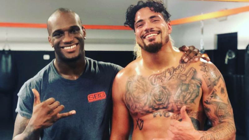 The MMA fighter - Jared Gooden, left - and the NFL linebacker - Duke Riley - at ease in the gym. (Photo courtesy Jared Gooden)