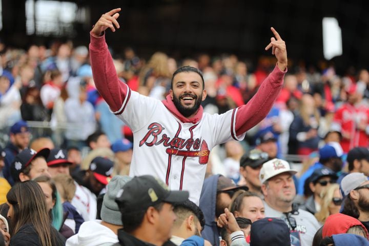 A fan of the Atlanta Braves shows his joy after listening to rapper Big Boi who started the concert after the official ceremony on Friday, November 5, 2021.
Miguel Martinez for The Atlanta Journal-Constitution