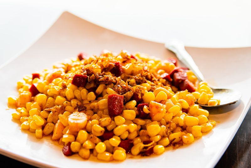 The Cajun stir-fry corn is a particularly tasty side dish at Kajun Crab. CONTRIBUTED BY HENRI HOLLIS