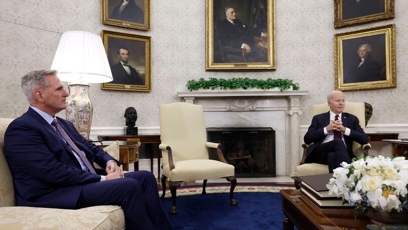 U.S. Speaker of the House Kevin McCarthy, R-Calif., and President Joe Biden meet with other lawmakers in the Oval Office of the White House on May 9, 2023, in Washington, D.C. The two leaders met again on Tuesday afternoon. (Anna Moneymaker/Getty Images/TNS)