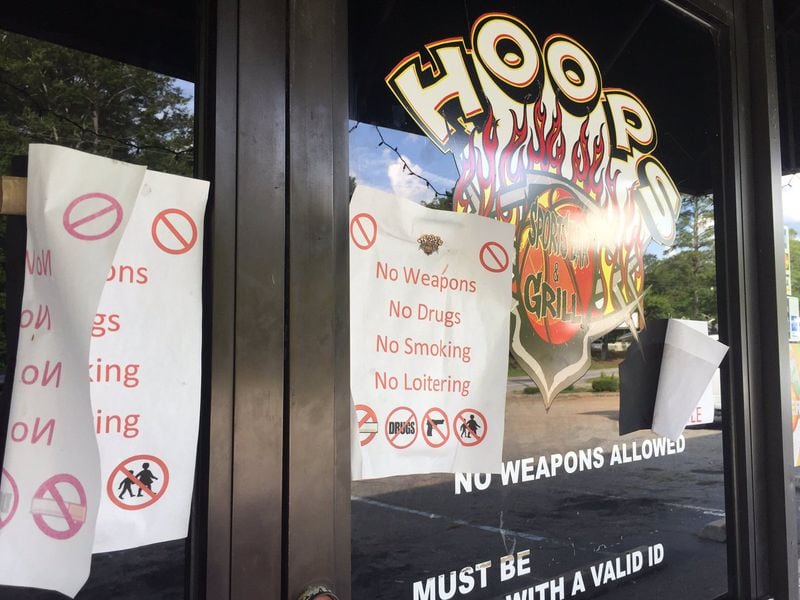 Hoops Bar and Grill is closed following a weekend police raid in which deputies found drugs and arrested dozens on probation violations. (Credit: Channel 2 Action News)