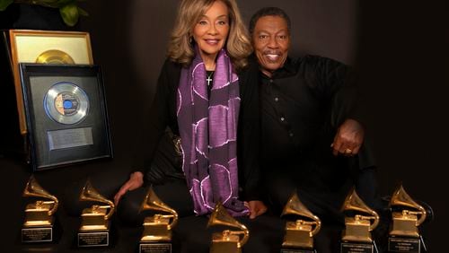 Marilyn McCoo and Billy Davis Jr. pose with Grammys and RIAA Record Awards. Courtesy of Guttman PR.