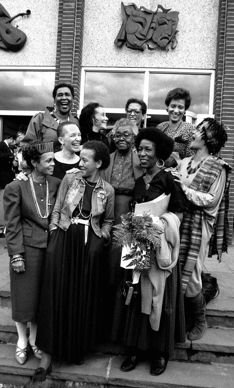 “SisterLove” is a photograph of Johnnetta Cole (top center) and several well-known African-American writers including (in no specific order) Pearl Cleage, Nikki Giovanni, and Sonia Sanchez. CREDIT: Jim Alexander 