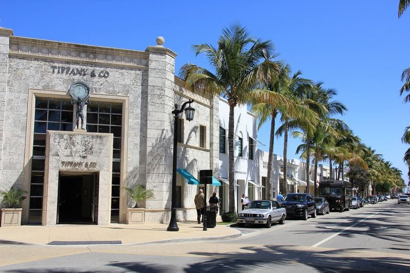Palm-lined Worth Avenue is an upscale shopping and dining district in Palm Beach, Fla. CONTRIBUTED BY DISCOVER THE PALM BEACHES