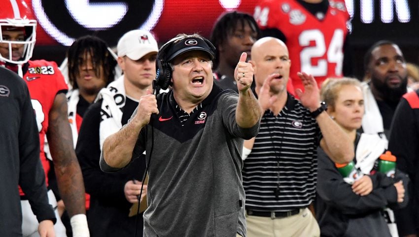 Georgia Bulldogs head coach Kirby Smart calls in a play against the TCU Horned Frogs during the second half of the College Football Playoff National Championship at SoFi Stadium in Los Angeles on Monday, January 9, 2023. (Hyosub Shin / Hyosub.Shin@ajc.com)
