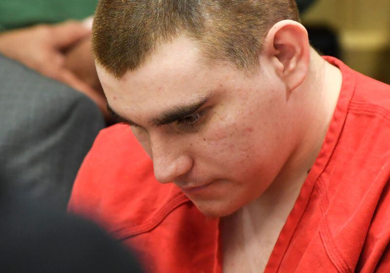 In this June 8, 2018 file photo, school shooting suspect Nikolas Cruz sits in the Broward County courthouse in Fort Lauderdale, Florida.