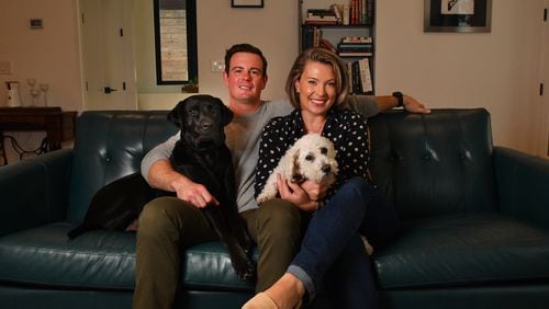 Joey Ward, executive chef and owner of Southern Belle and Georgia Boy in Atlanta, shares his home life with his wife, Emily Ward, an Atlanta lawyer, and their two dogs, Forrest and Louis. (Chris Hunt for the AJC)