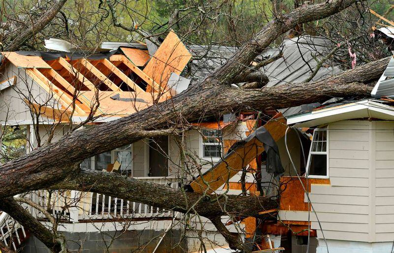 A large tree fell on a home at the corner of W. Mitchell St. and Fraley Ave. in Milledgeville after strong storms rolled through over the weekend. (Photo Courtesy of Jason Vorhees/The Telegraph)