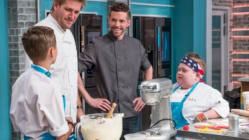 TOP CHEF JUNIOR -- Episode 106 -- Pictured: (l-r) Head Judge Curtis Stone, Guest Chef Joshua John Russell, Fuller Goldsmith -- (Photo by: Dale Berman/Universal Kids)