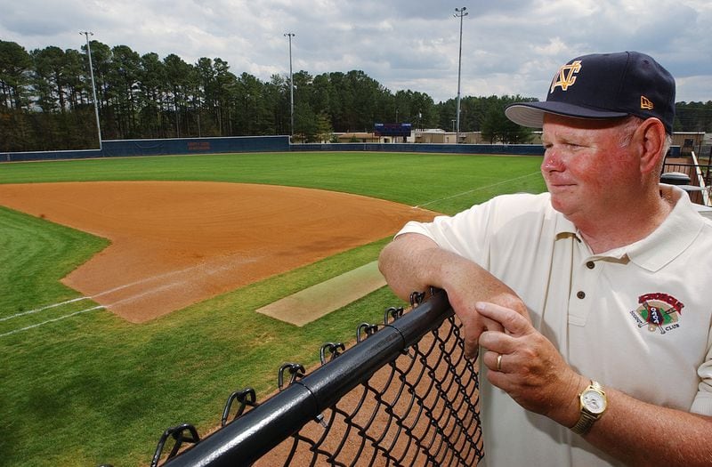 High School baseball coach Harvey Cochran is shown in this 2003 photo looking out onto the field named after him. Cochran coached at North Cobb High School and other schools for decades. (ANDY SHARP/AJC staff)
