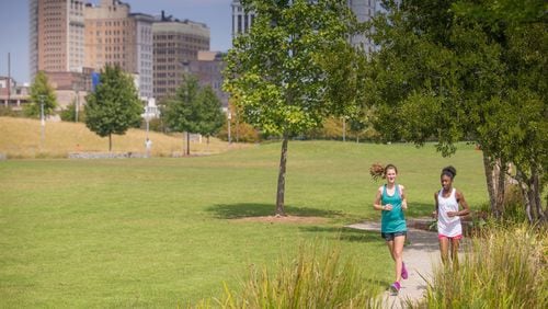 The development of Railroad Park, a 19-acre urban green space, has helped transform the surrounding neighborhoods in downtown Birmingham, Ala. CONTRIBUTED BY CHRIS GRANGER / ALABAMA TOURISM DEPARTMENT