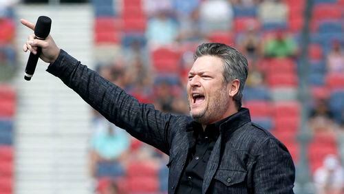 Country music singer and television personality Blake Shelton performs prior to a NASCAR Cup Series auto race at Phoenix Raceway, Sunday, March 8, 2020, in Avondale, Ariz.