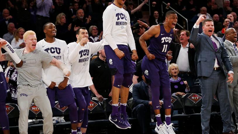 The TCU bench reacts against Central Florida during the second half of an NCAA college basketball game in the semifinals of the NIT Tuesday, March 28, 2017, in New York. (AP Photo/Kathy Willens)