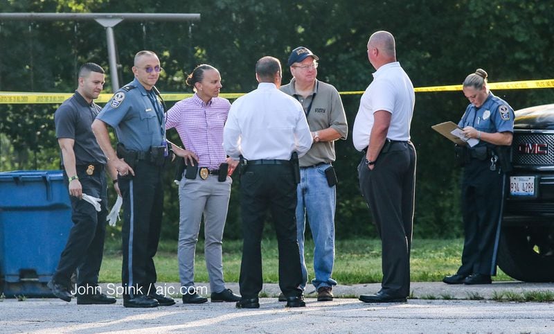 A woman was detained after Gwinnett police found a man and several children dead in a home in Loganville, police said. JOHN SPINK / JSPINK@AJC.COM